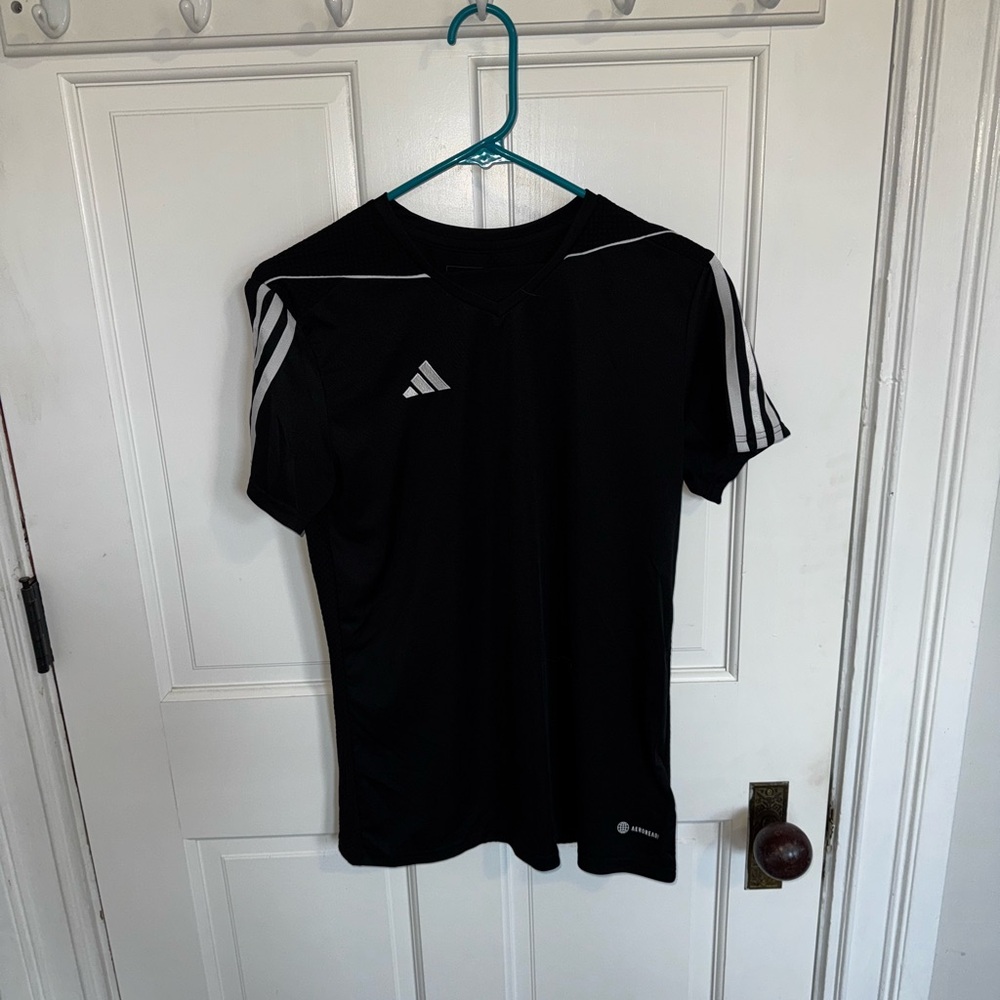 Adidas women’s soccer top, size medium